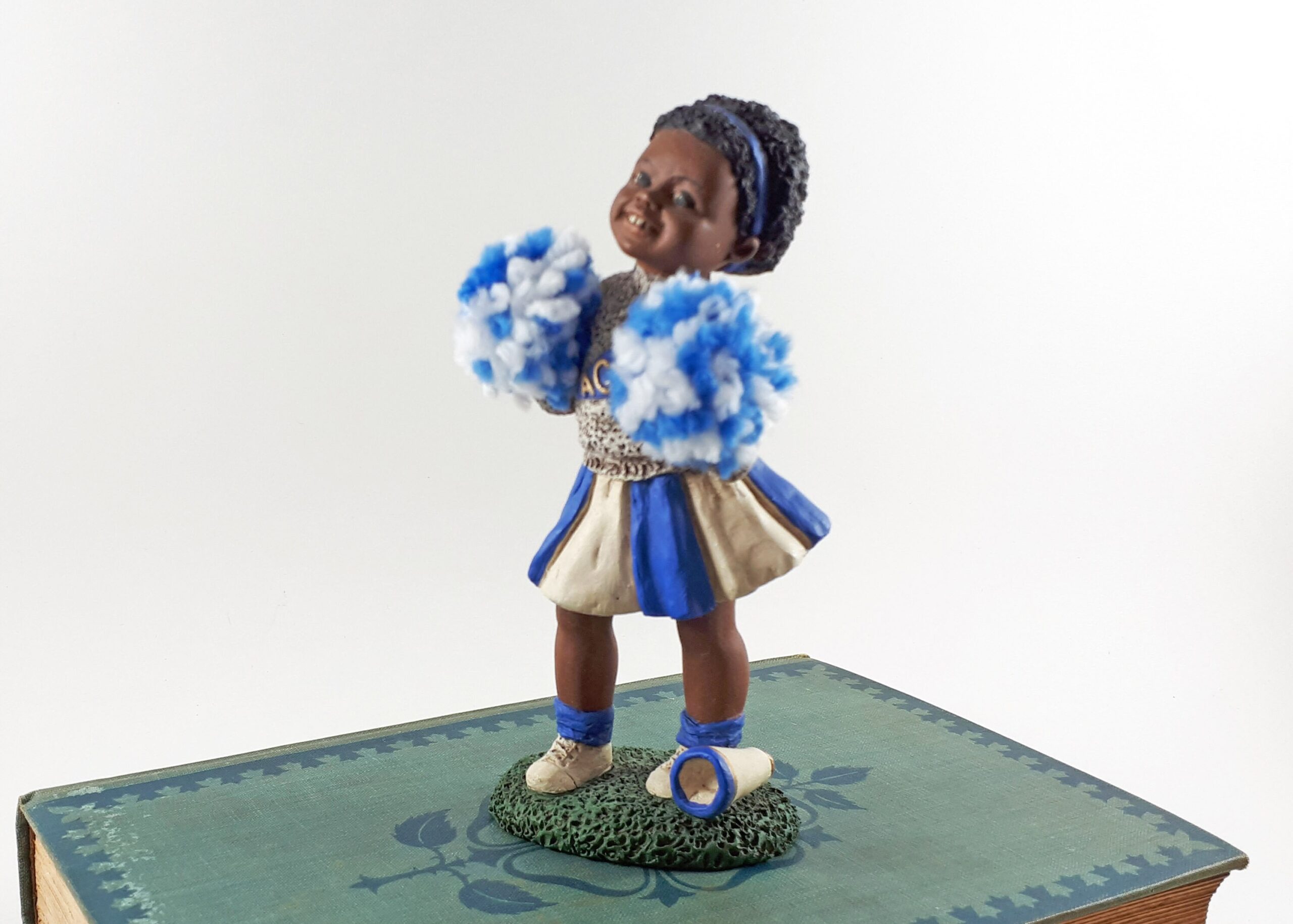 Playful Bobblehead Cheerleaders